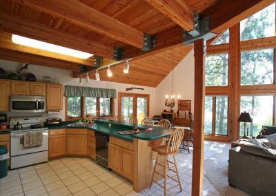 Cabin home kitchen with large windows