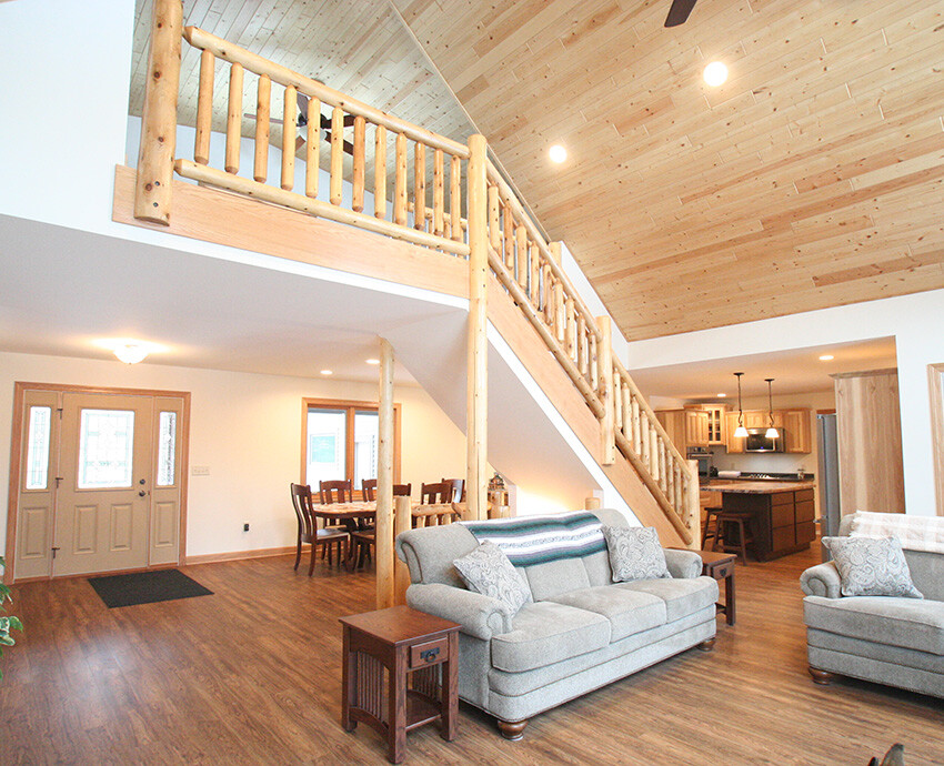 Woodcraft Quality Homes, Necedah WI inside living area with cathedral ceiling stairwell