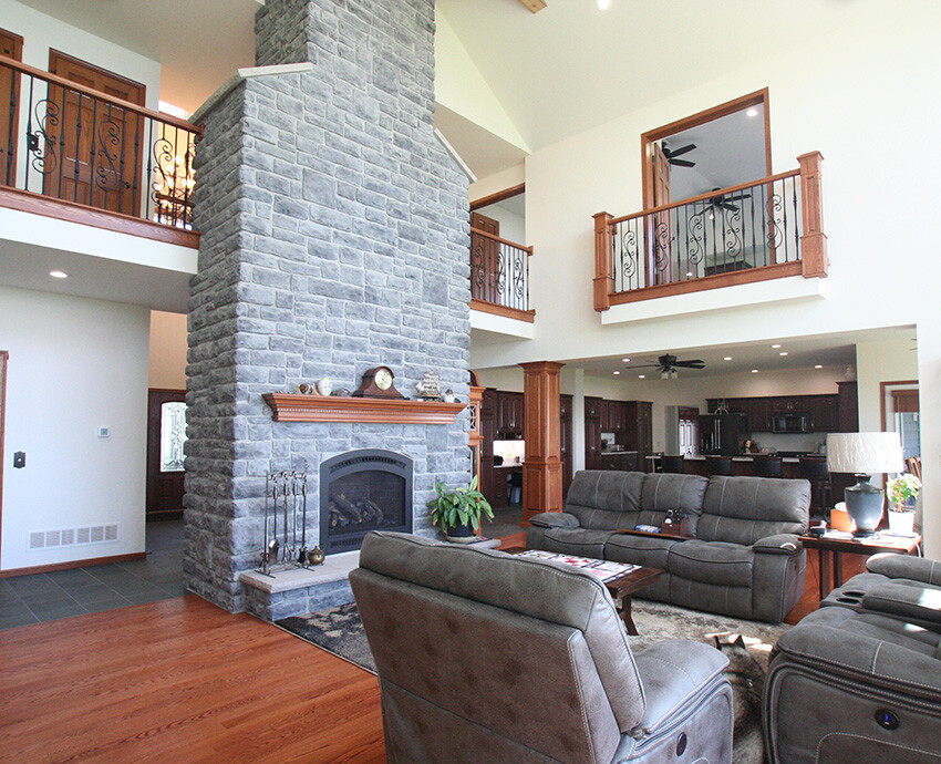 Woodcraft Quality Homes, Necedah WI Indoor Living area with brick fireplace